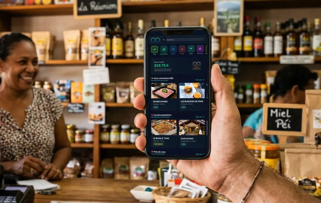 L'application Loops ouverte dans une boutique de produits péi, devant les rayons